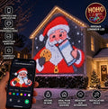 HoHo Glow — LED Light Curtain, custom Santa display on a house facade